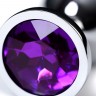 Серебристая коническая анальная пробка с фиолетовым кристаллом - 8 см.