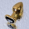 Золотистая коническая анальная пробка с черным кристаллом-сердечком - 7 см.