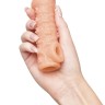 Телесная закрытая насадка с пучками шишечек Cock Sleeve Size S - 13,8 см.