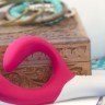 Розовый вибромассажёр с клиторальным отростком We Vibe Nova Pink - 21,5 см.